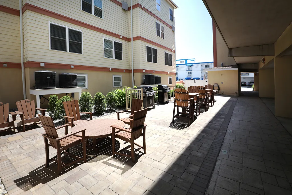 Grilling area outside of pool entrance 