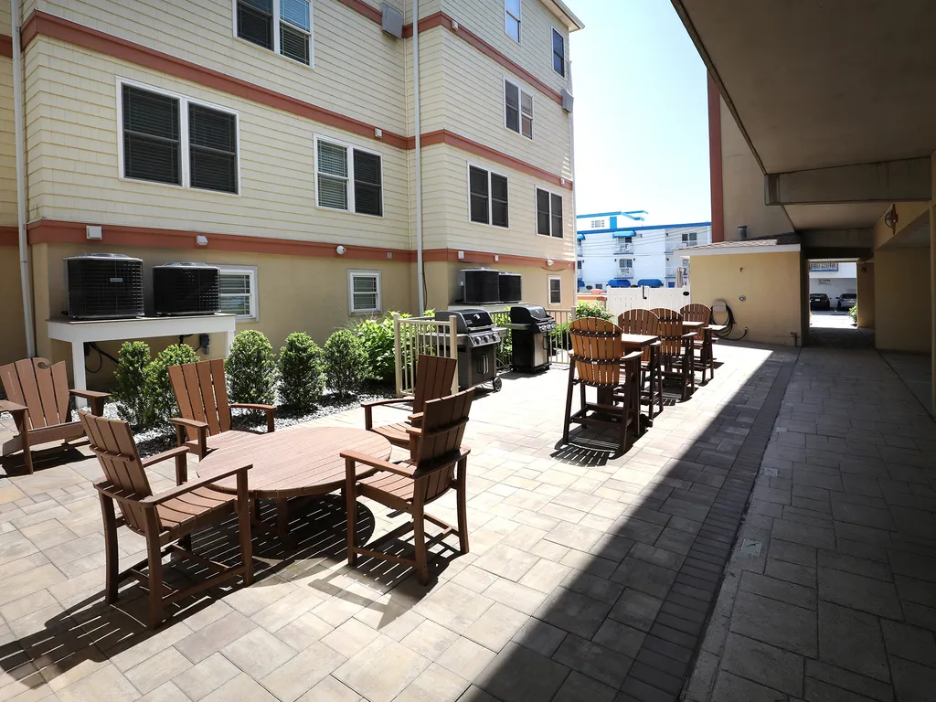 Grilling area outside of pool entrance 