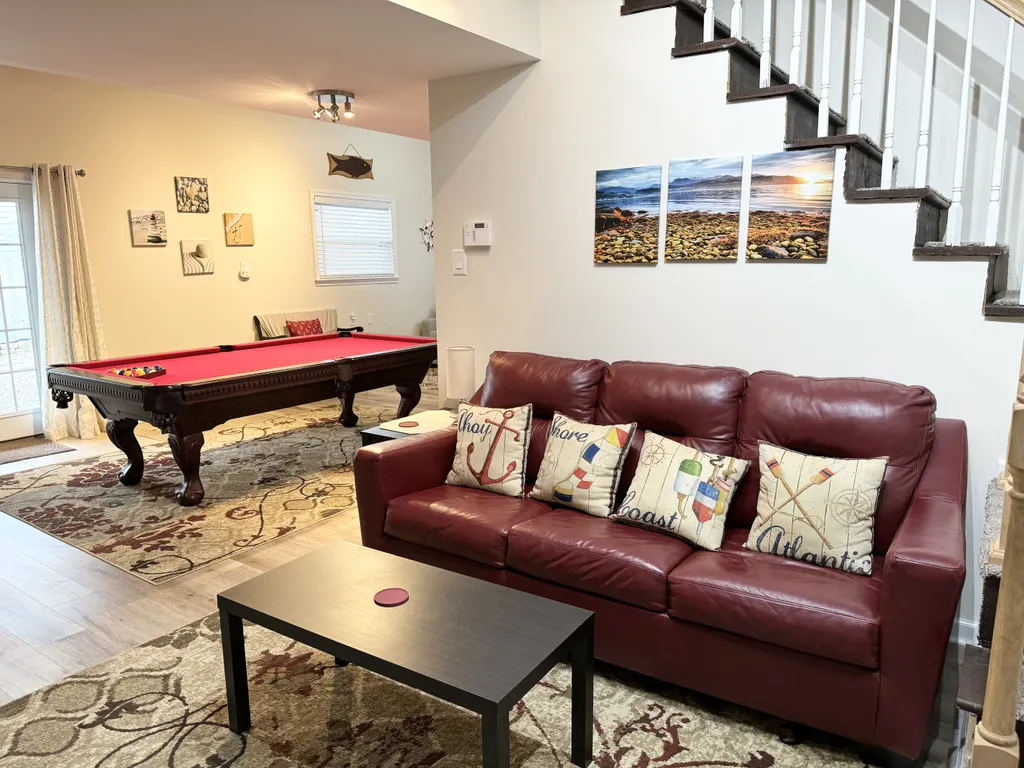 Ground/first floor living space doubles as 6th private bedroom.
