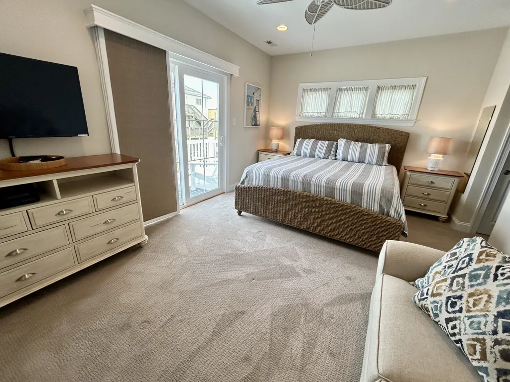 2nd Floor - Jr. Primary w/ King Bed, ensuite bathroom, pullout couch (full size bed) &amp;amp; private deck (sleeps 4)