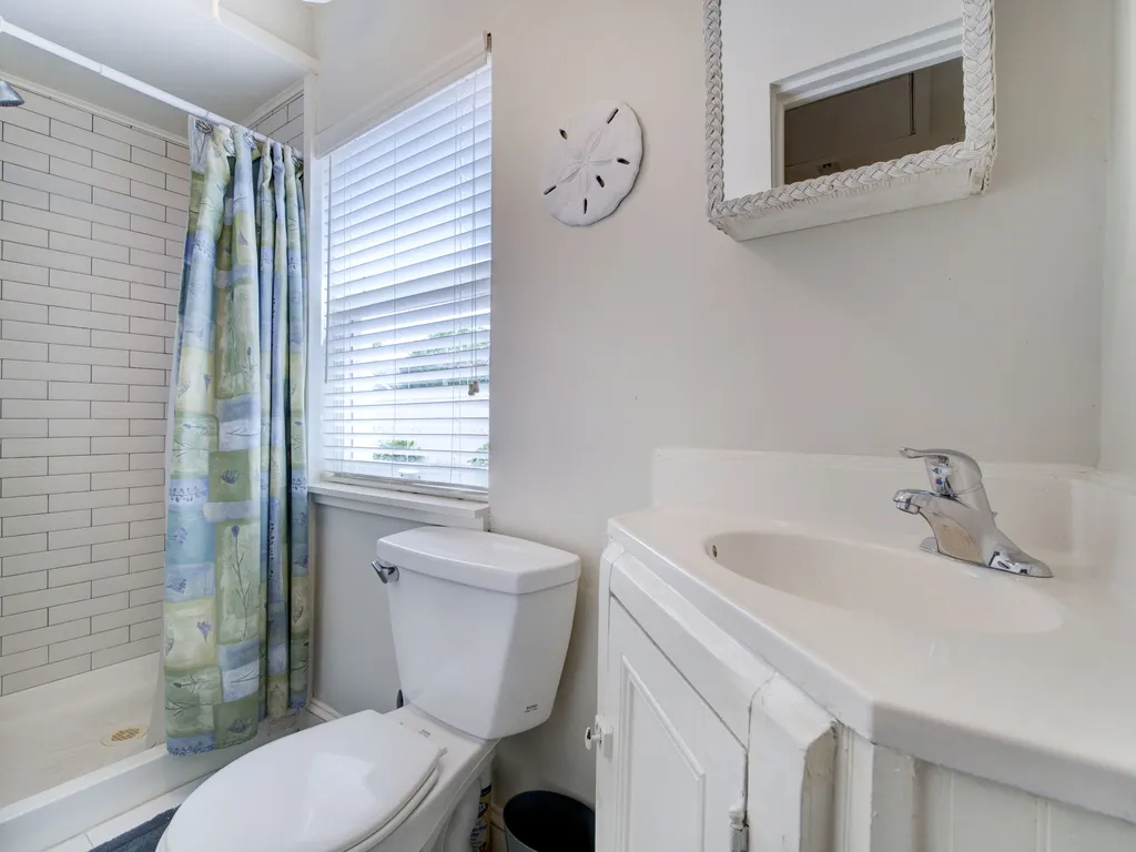 2nd full bath off family room  with stall shower