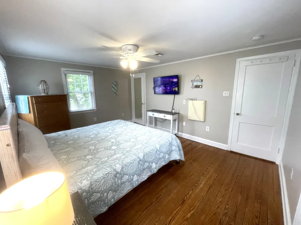 Another view of the primary bedroom