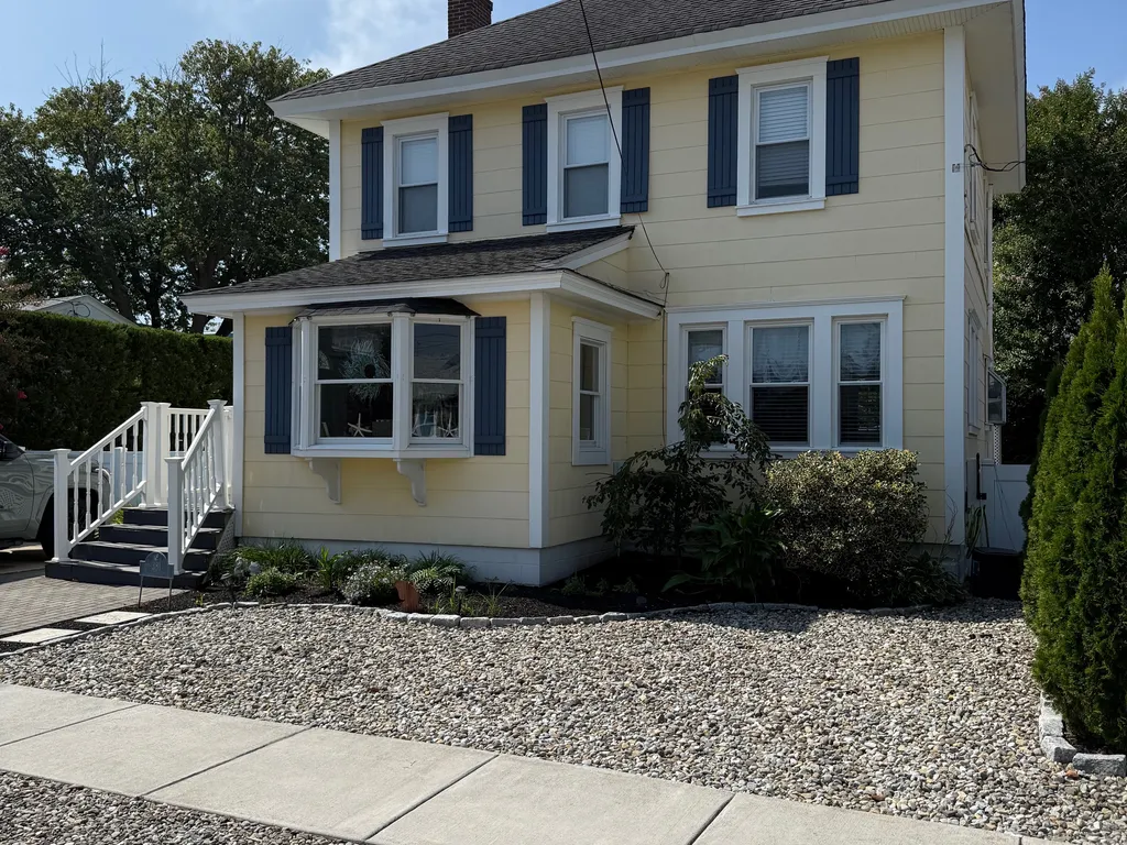 Front Main House w/ sidewalk to town! 