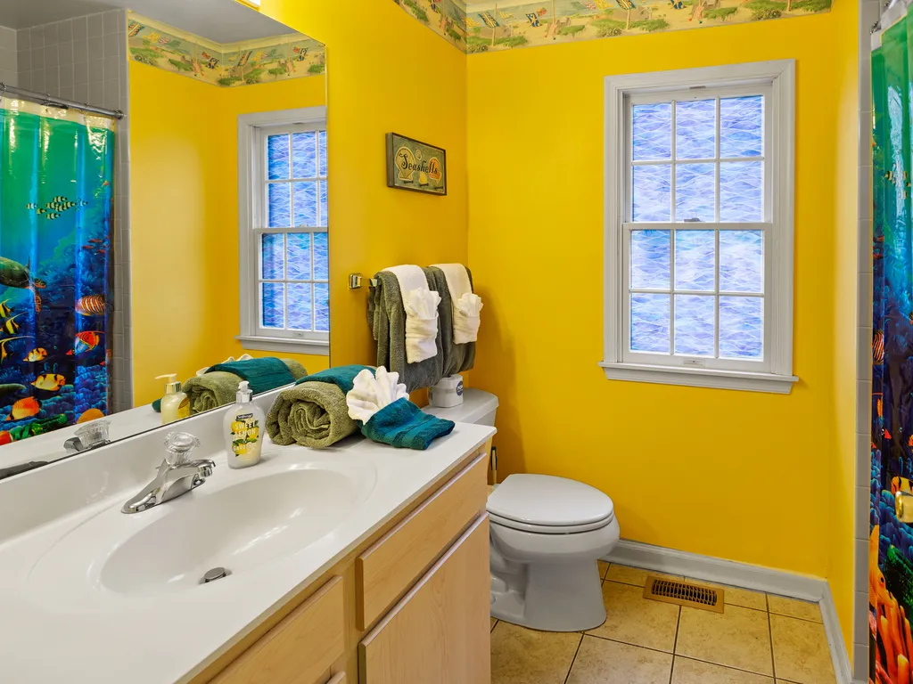 ❤️ Many reviews note how much they LOVE having three Bathrooms! The bathroom is decorated with fun Beach themed decorations and is always immaculately clean! All towels are fresh and clean and provided by us!