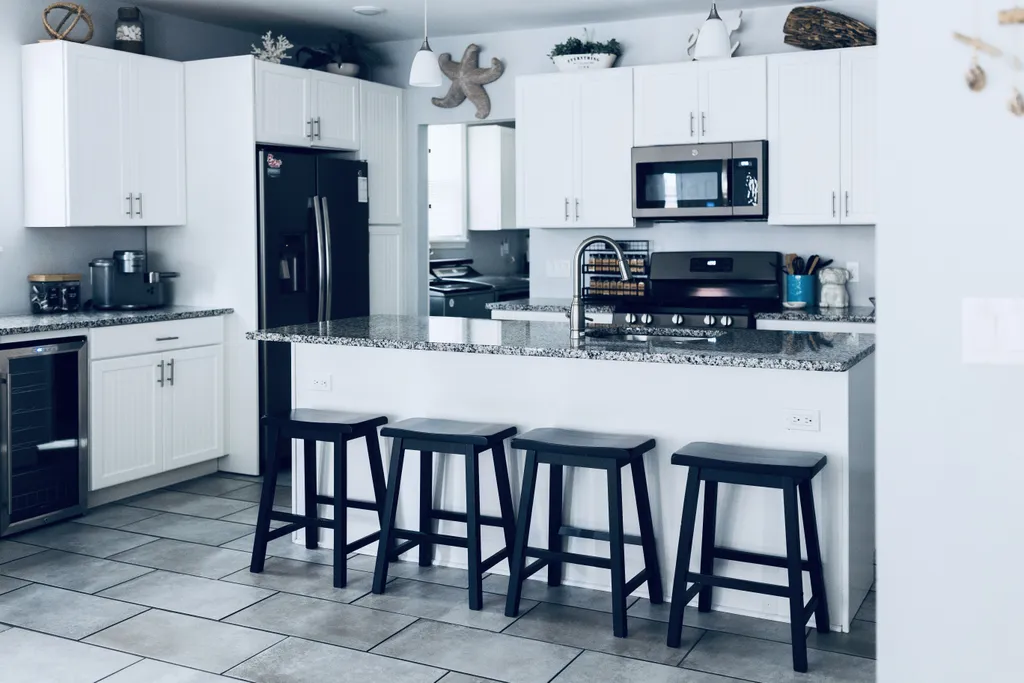 Fully Stocked Kitchen with Stainless Steel Appliances