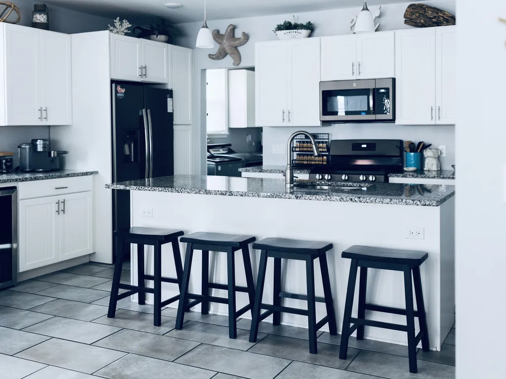 Fully Stocked Kitchen with Stainless Steel Appliances