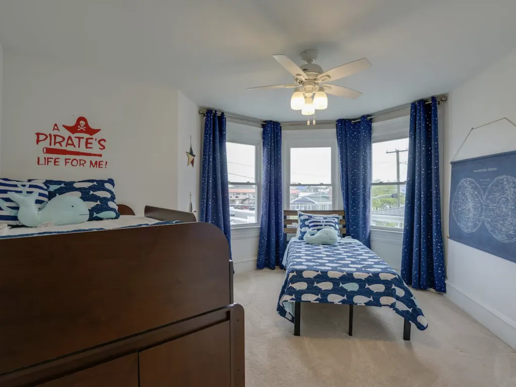 The Pirate Room has a lofted twin bed and a twin bed