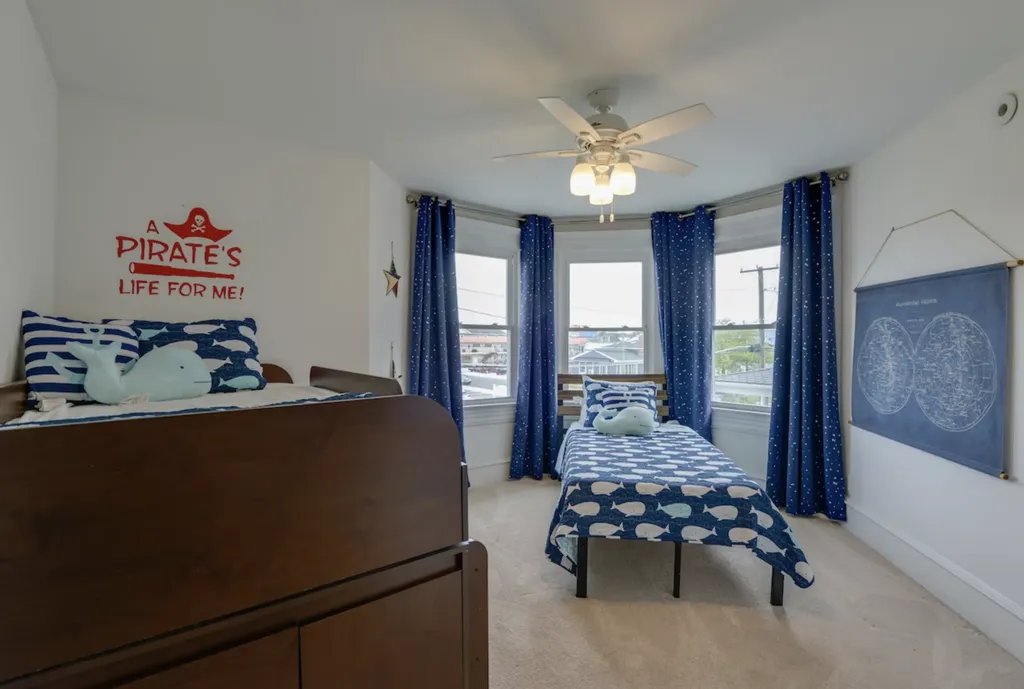 The Pirate Room has a lofted twin bed and a twin bed