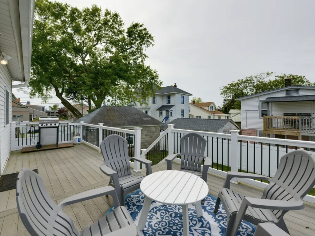 The back deck, which is just off the kitchen, is another great place to relax outdoors