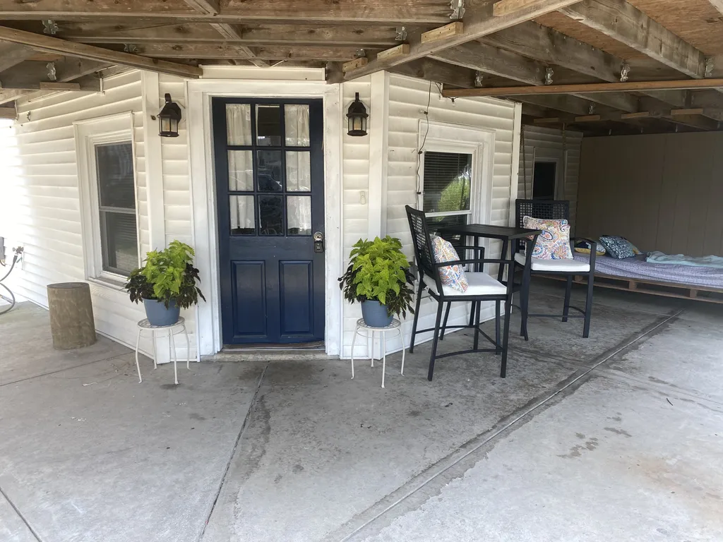 Down below the main house, you will find a separate entrance to the 2 bedroom apartment