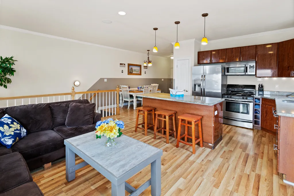 ❤️ Beautiful kitchen and living room area! A Great Place for you to gather with friends and family! Enjoy water views and the fresh sea air from the Large Outside Deck! A 65&amp;rdquo; 4K TV with Free HBO, Sports Channels, and lots of channels are available!