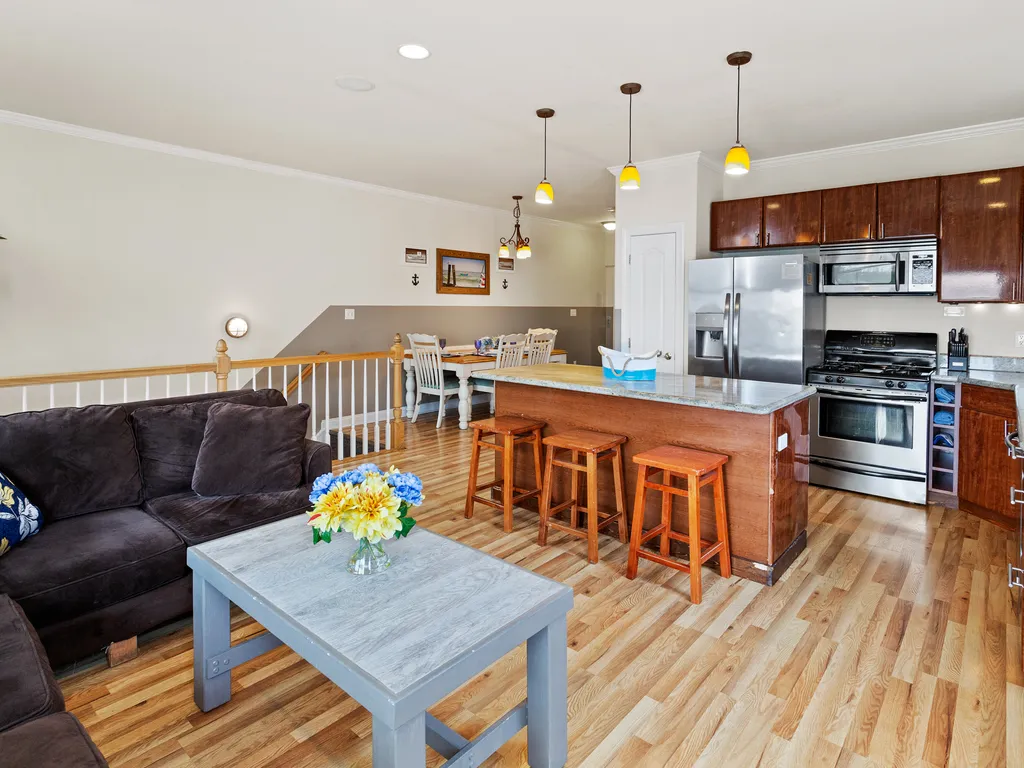 ❤️ Beautiful kitchen and living room area! A Great Place for you to gather with friends and family! Enjoy water views and the fresh sea air from the Large Outside Deck! A 65&amp;rdquo; 4K TV with Free HBO, Sports Channels, and lots of channels are available!