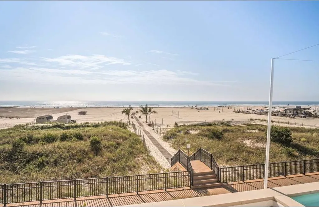 330 ft. Wide Private beach with complimentary concierge chair and umbrella service