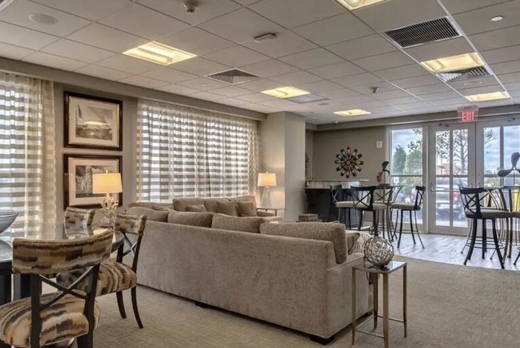 Community Room with refrigerator and ice machine located on pool level