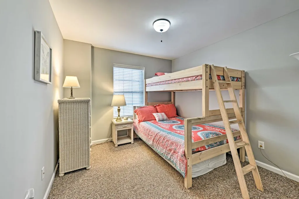 4th bedroom with twin over full bunk and extra mattress under bed