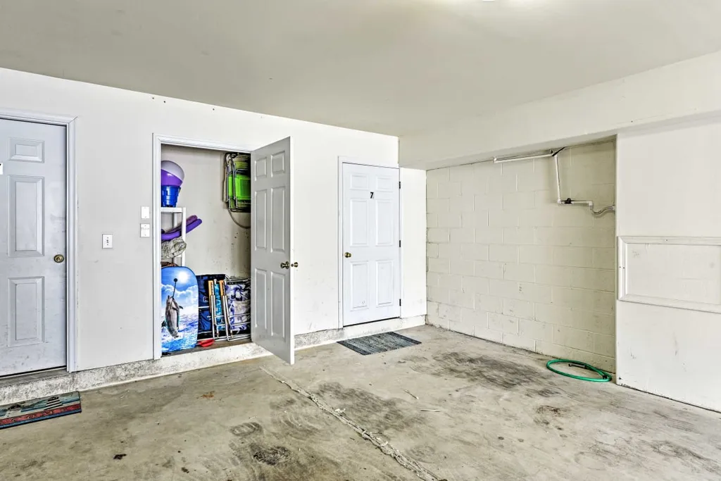 Beach closet with chairs, umbrella and toys