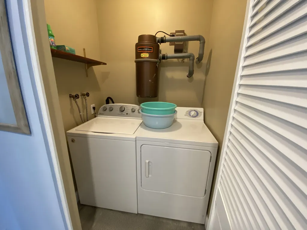 First floor laundry with full size washer and dryer.