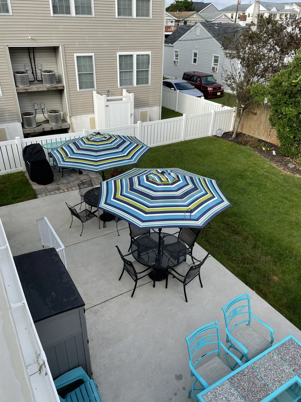  view of patio from balcony with gas grill