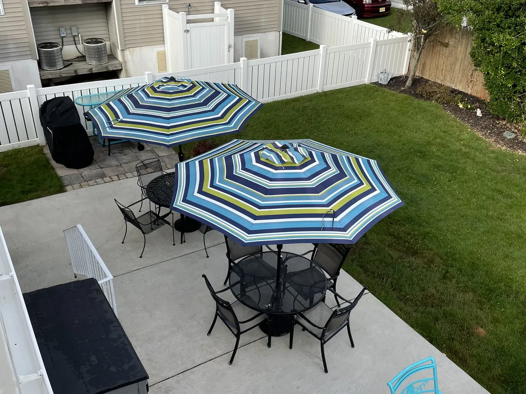  view of patio from balcony with gas grill
