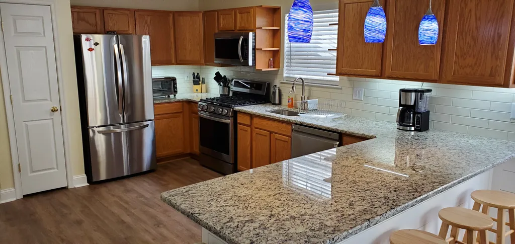 New Granite Counter Tops, Ceramic Backsplash &amp;amp; Under Cabinet Lighting