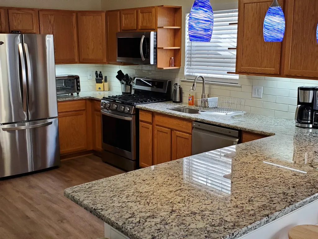 New Granite Counter Tops, Ceramic Backsplash &amp;amp; Under Cabinet Lighting