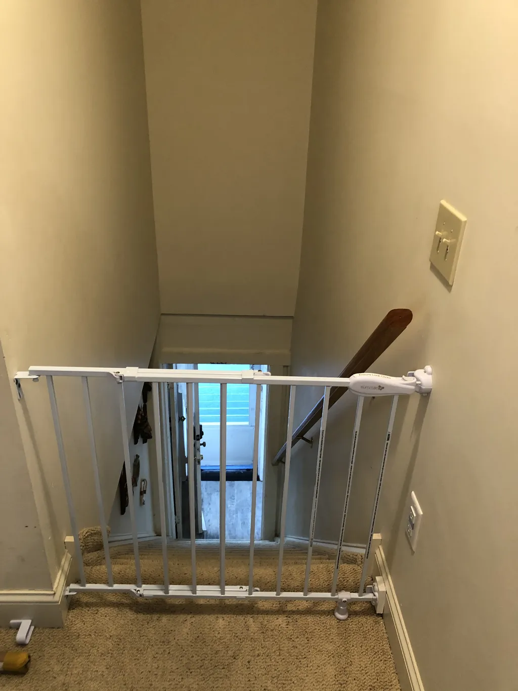 Baby gate in upstairs rec room