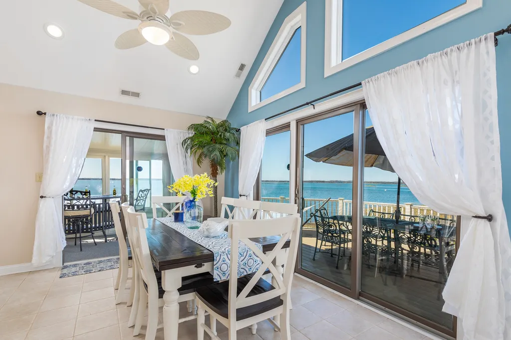 Kitchen Table overlooking deck and sunroom