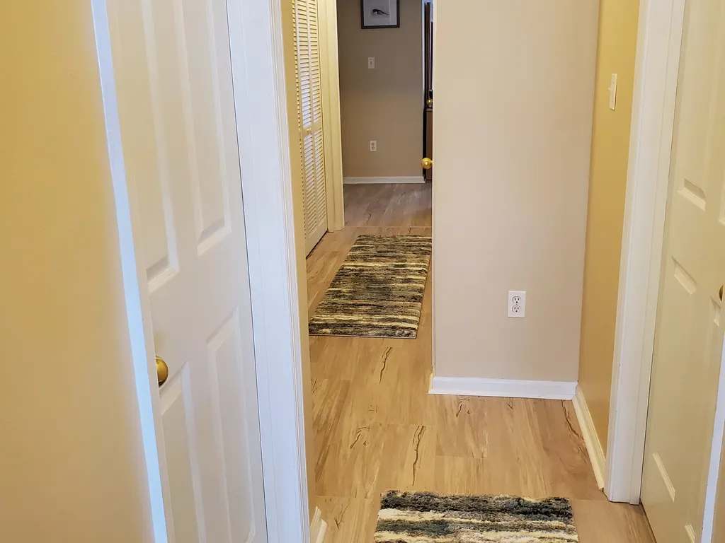 Hallway with new flooring throughout