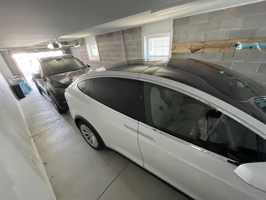 Two car garage can fit SUVs