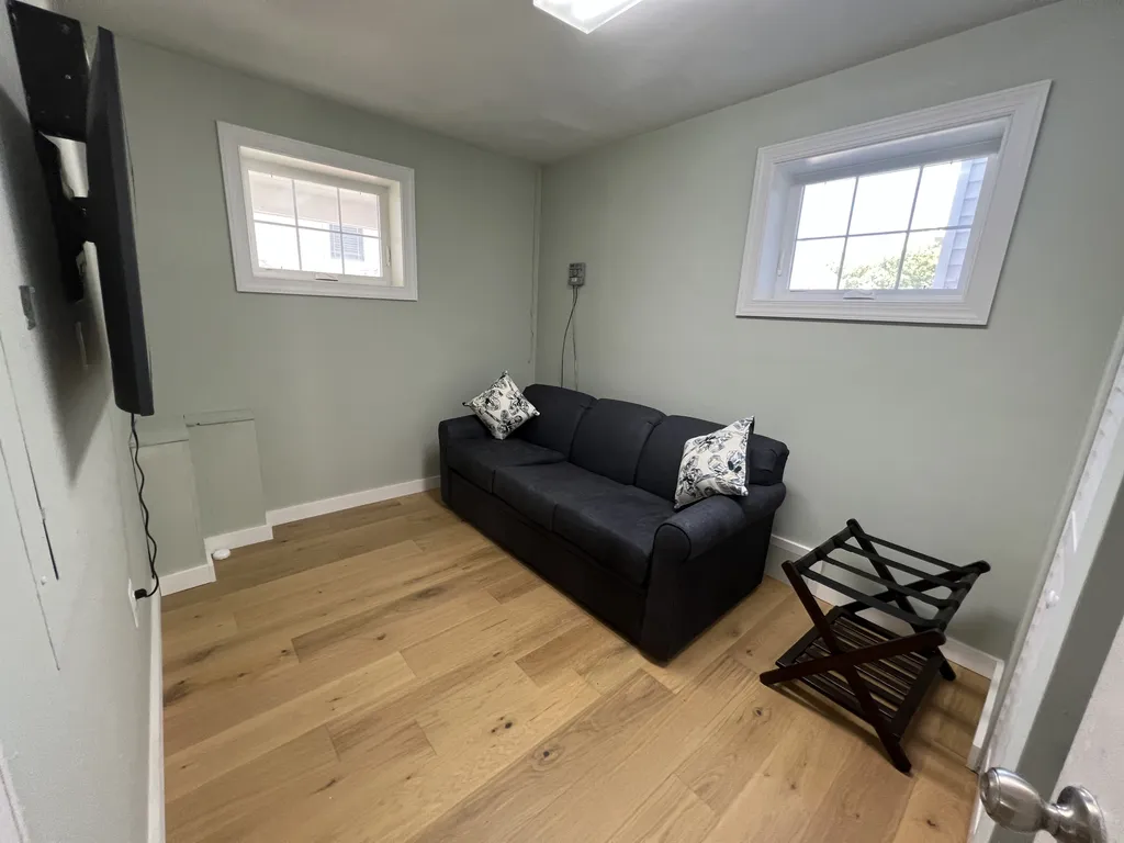 Ground level room with Queen sleeper sofa. Has central air, but note no bathroom on this level.