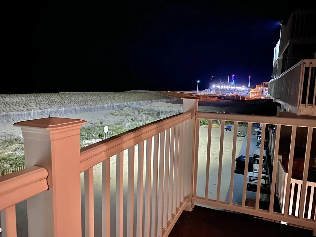 Night view of boardwalk from deck