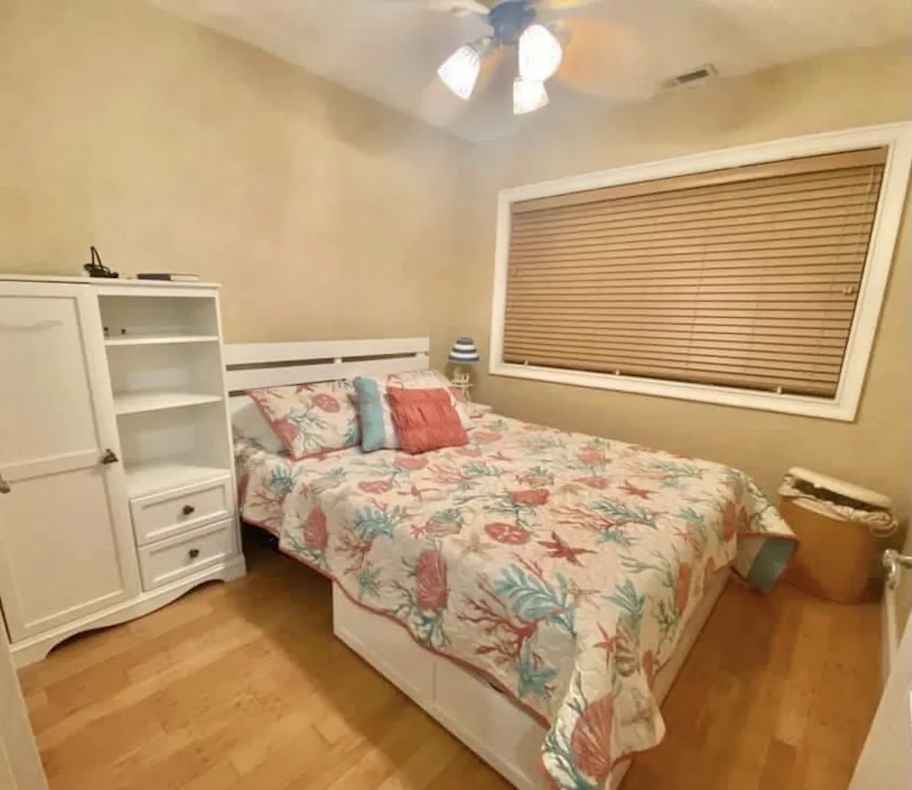 Main Bedroom Queen Bed, dresser, storage  drawer and hamper