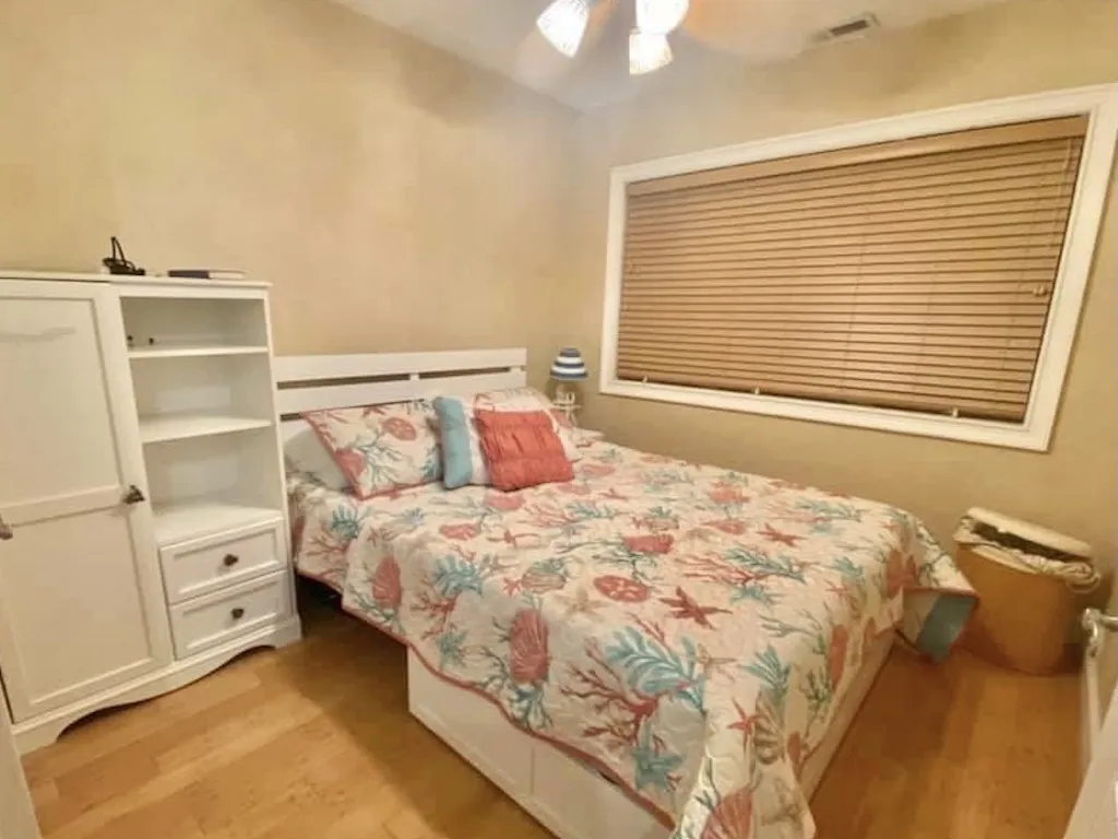 Main Bedroom Queen Bed, dresser, storage  drawer and hamper