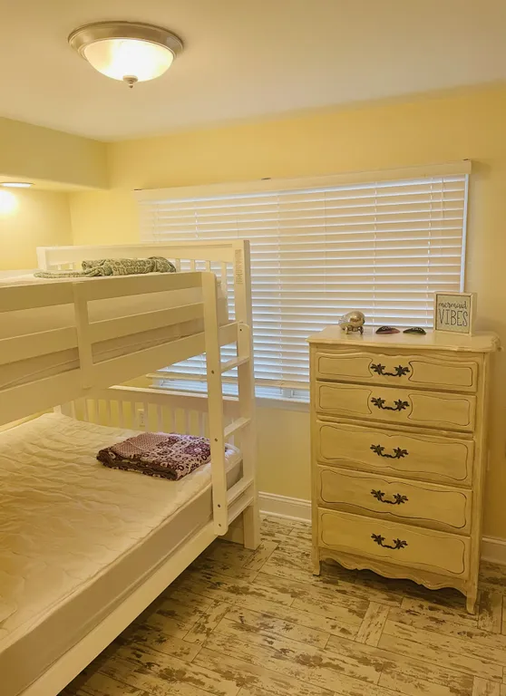 Second bedroom with sturdy full-on-full size beds