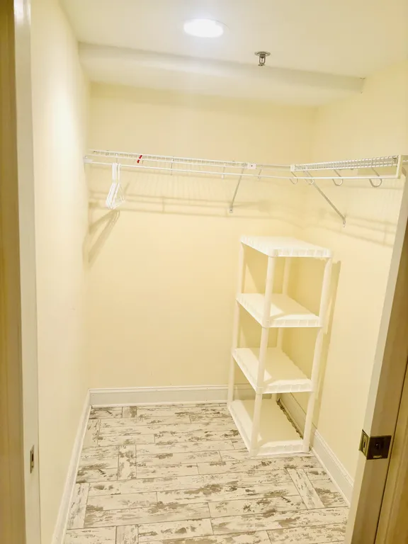 Large walk in closet in master bedroom 