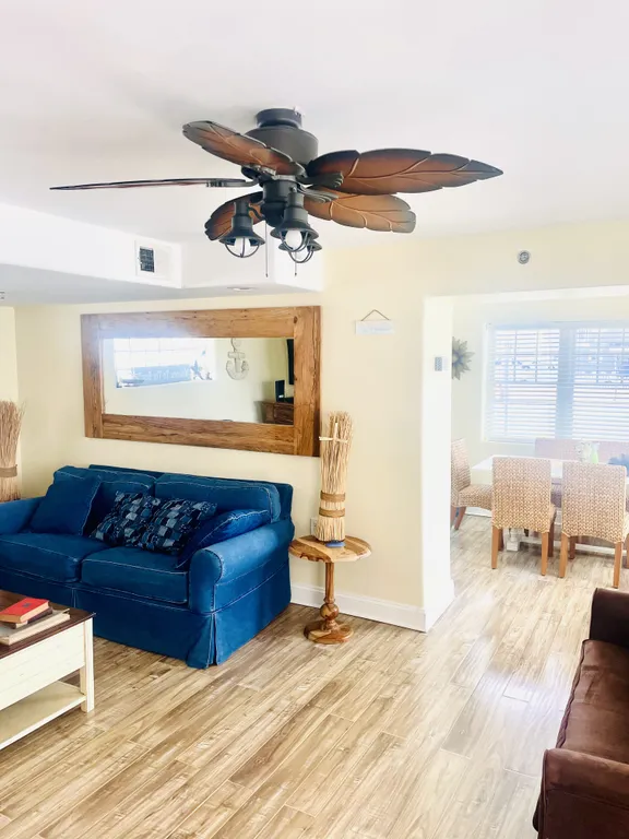 Three couches in the large living room