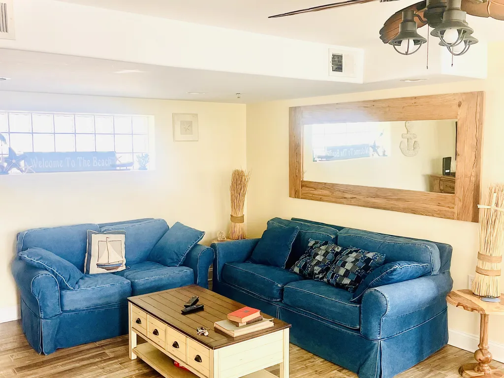 Large living room with sofa bed