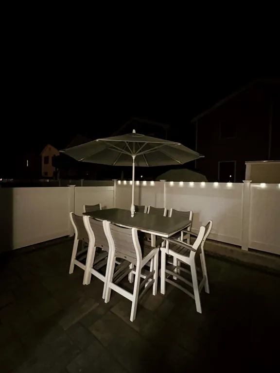 Brand new polywood bar height table that seats 8