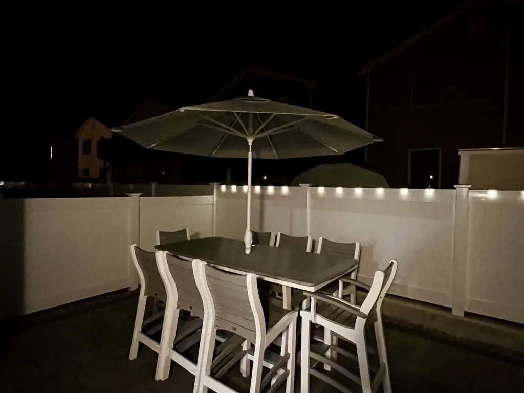 Brand new polywood bar height table that seats 8