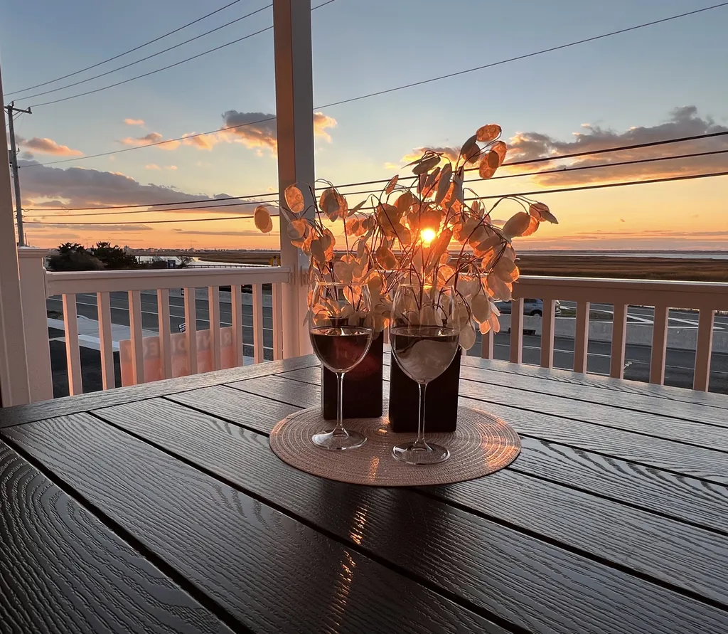 Stunning direct sunset views from decks off of living room and master bedroom