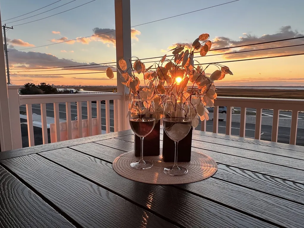 Stunning direct sunset views from decks off of living room and master bedroom