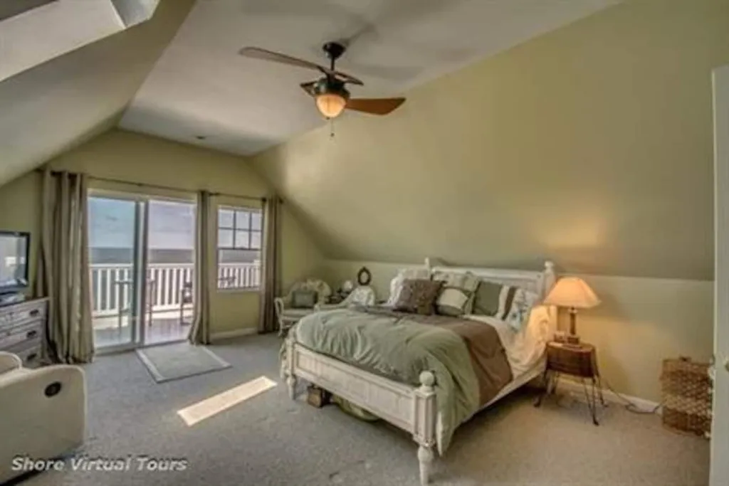 Bedroom 5 -Top floor Master bedroom  suite with private balcony and full bath