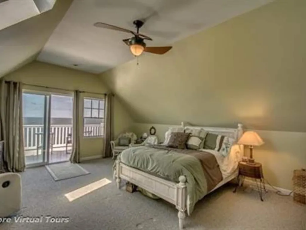 Bedroom 5 -Top floor Master bedroom  suite with private balcony and full bath