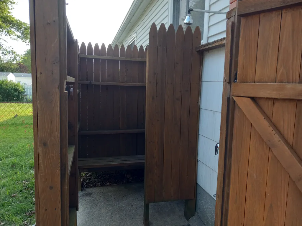 Outdoor shower and dressing area my father built in 1988