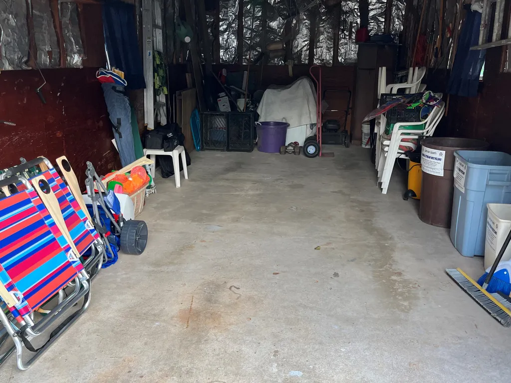 Chairs, beach toys, beach caddy, cooler, umbellas and games all stored in garage, and lots of room for your own stuff