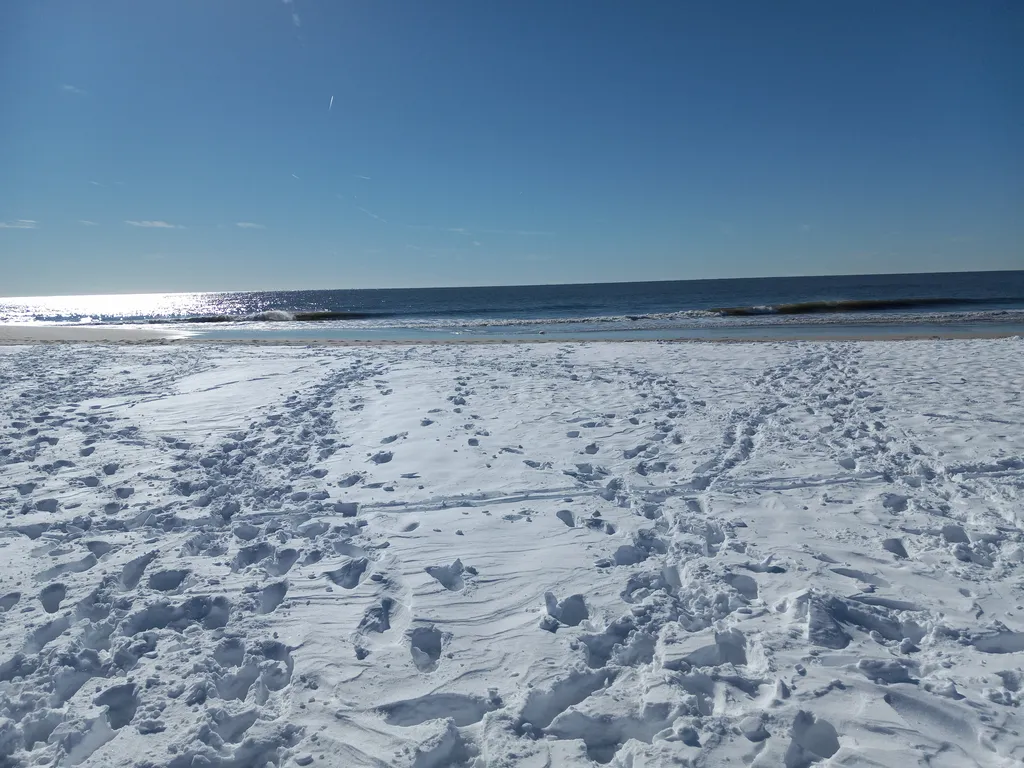 A winter snow storm left the sand white with snow