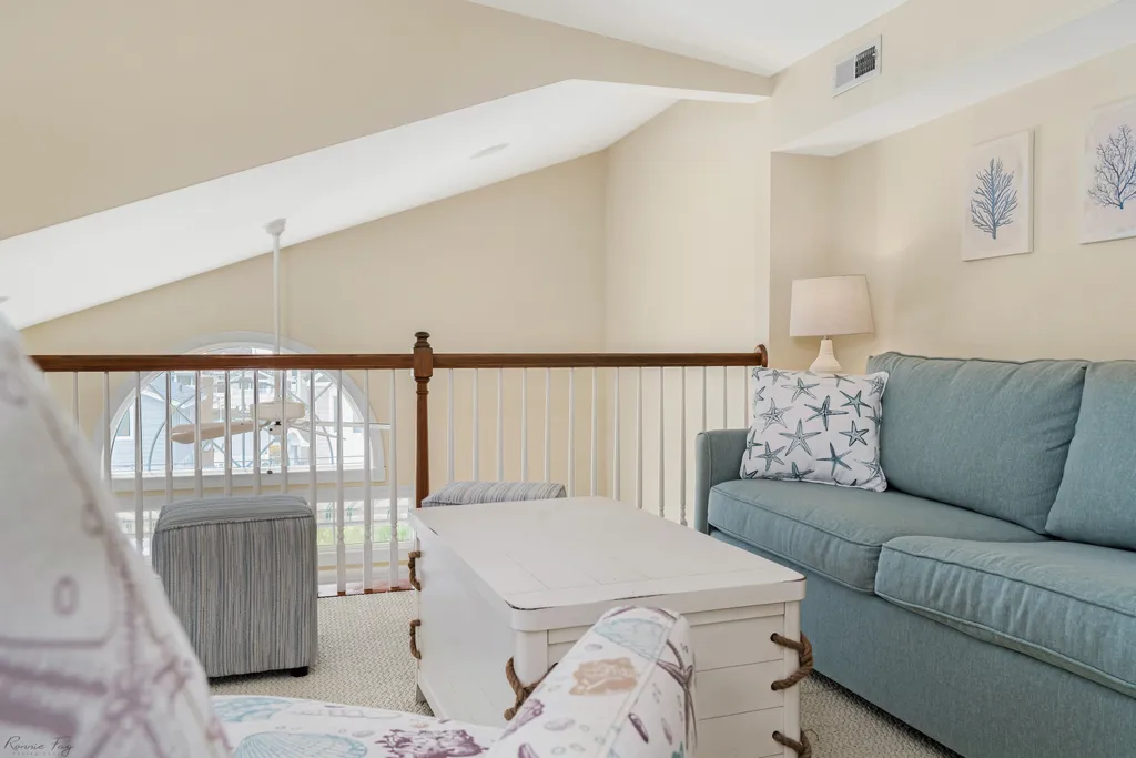 Unwind and entertain in our third-floor loft featuring a queen sleeper pull-out sofa. An ideal space for kids to have fun and extra room for guests to gather, creating lasting moments together