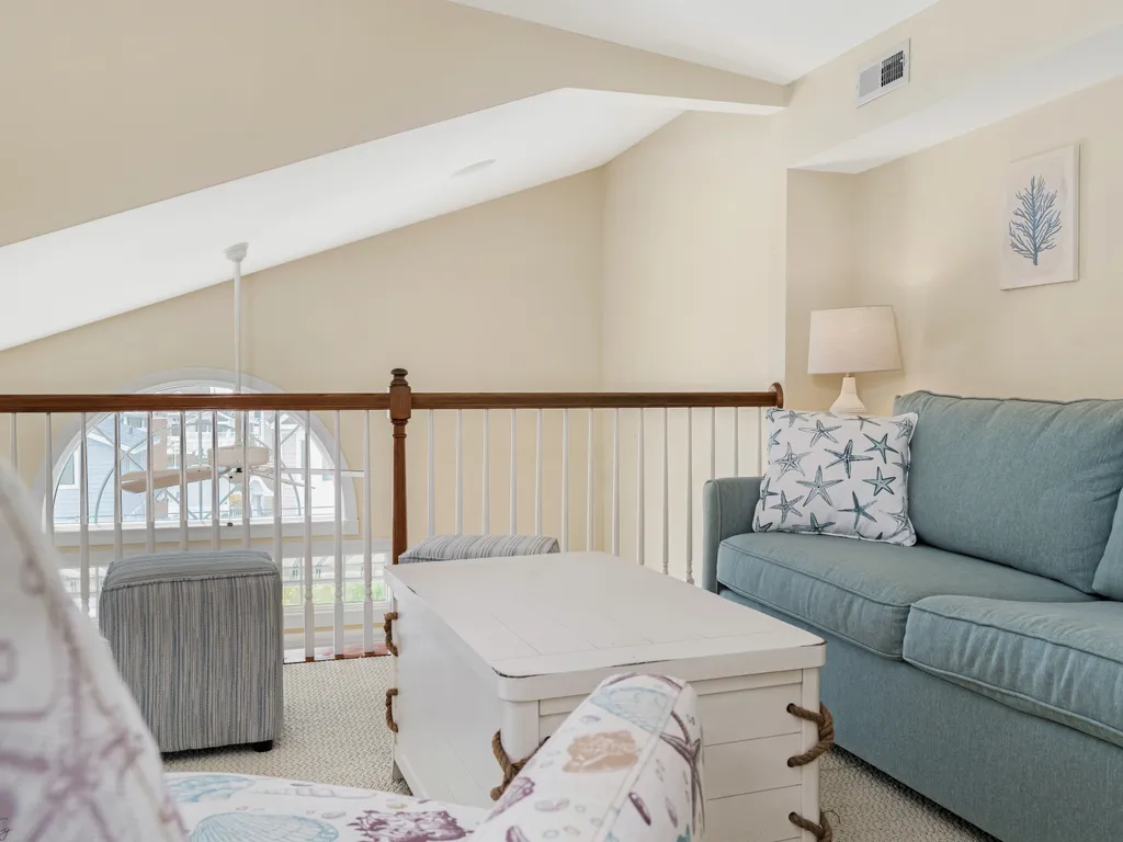 Unwind and entertain in our third-floor loft featuring a queen sleeper pull-out sofa. An ideal space for kids to have fun and extra room for guests to gather, creating lasting moments together