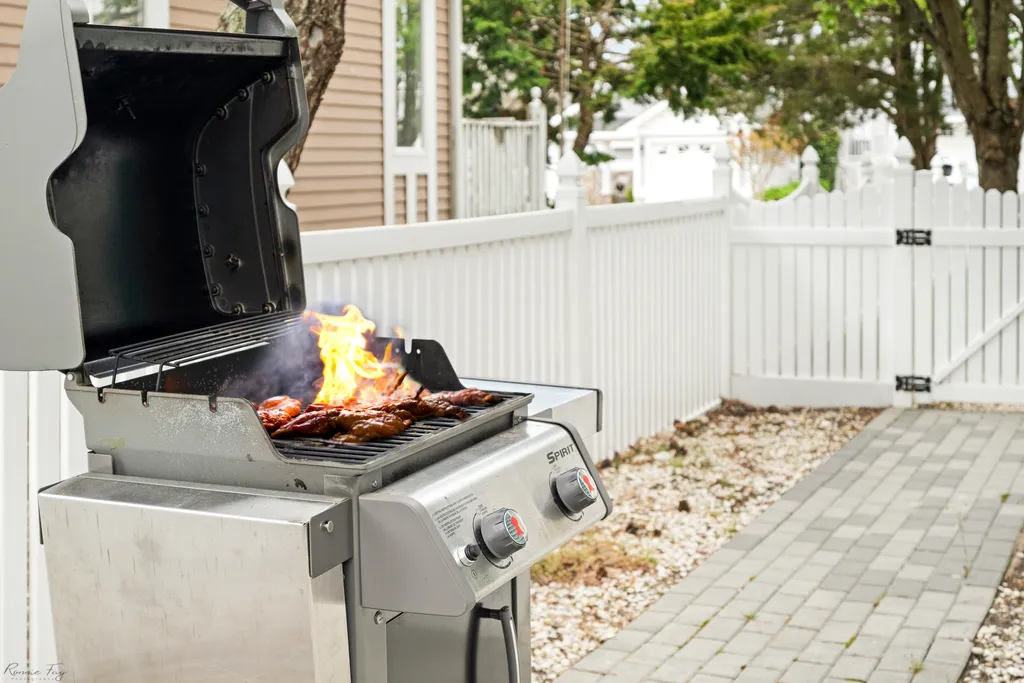 Savor the flavors of outdoor cooking at our grill-side oasis.