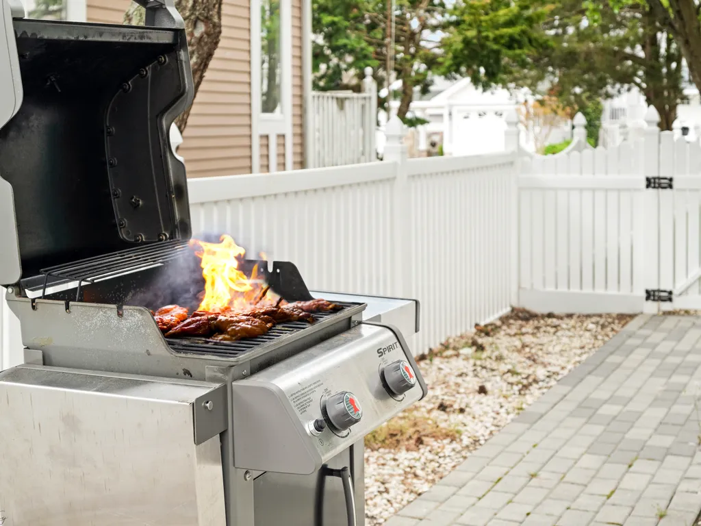 Savor the flavors of outdoor cooking at our grill-side oasis.